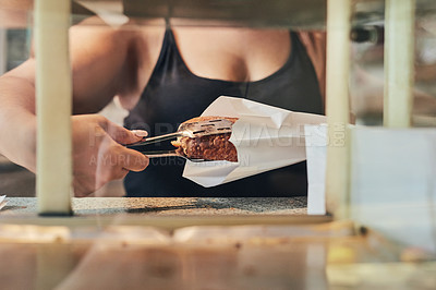 Buy stock photo Bakery, food and hand of person in store for small business, entrepreneur and restaurant. Coffee shop manager, barista and waitress with employee in cafe for pastry service, server and hospitality