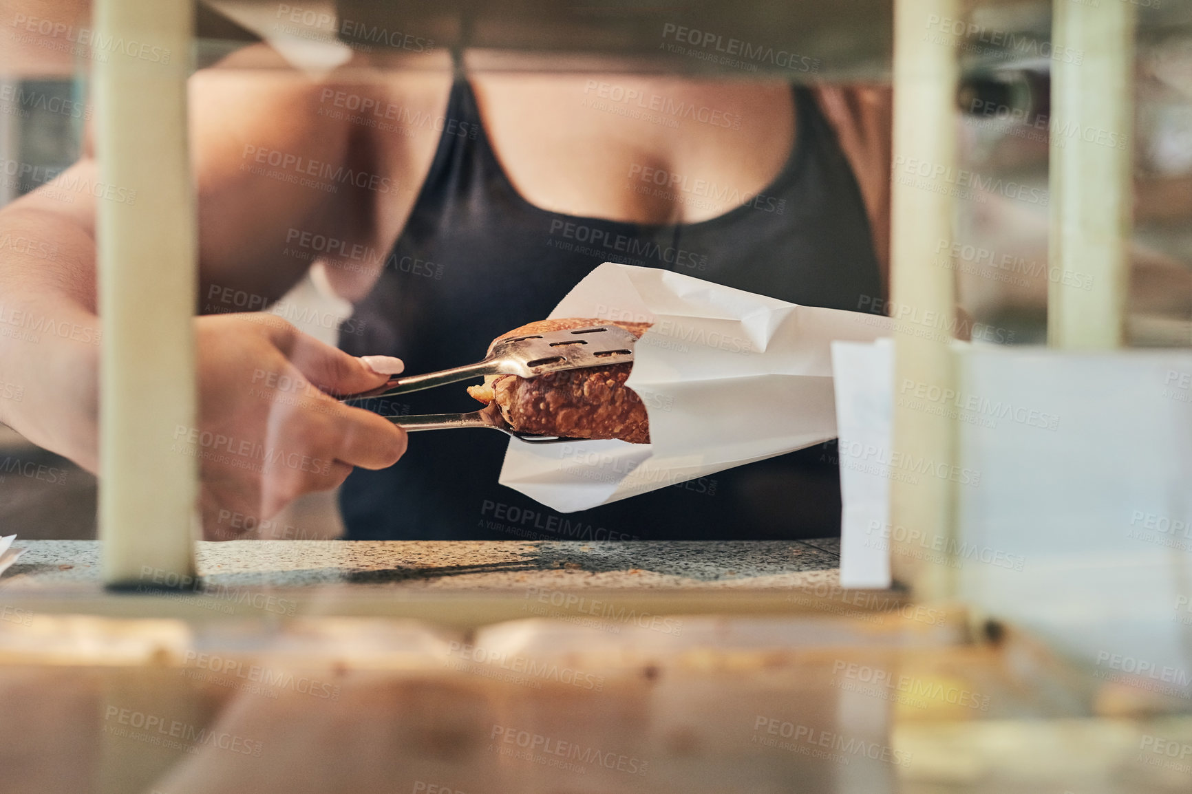 Buy stock photo Bakery, food and hand of person in store for small business, entrepreneur and restaurant. Coffee shop manager, barista and waitress with employee in cafe for pastry service, server and hospitality