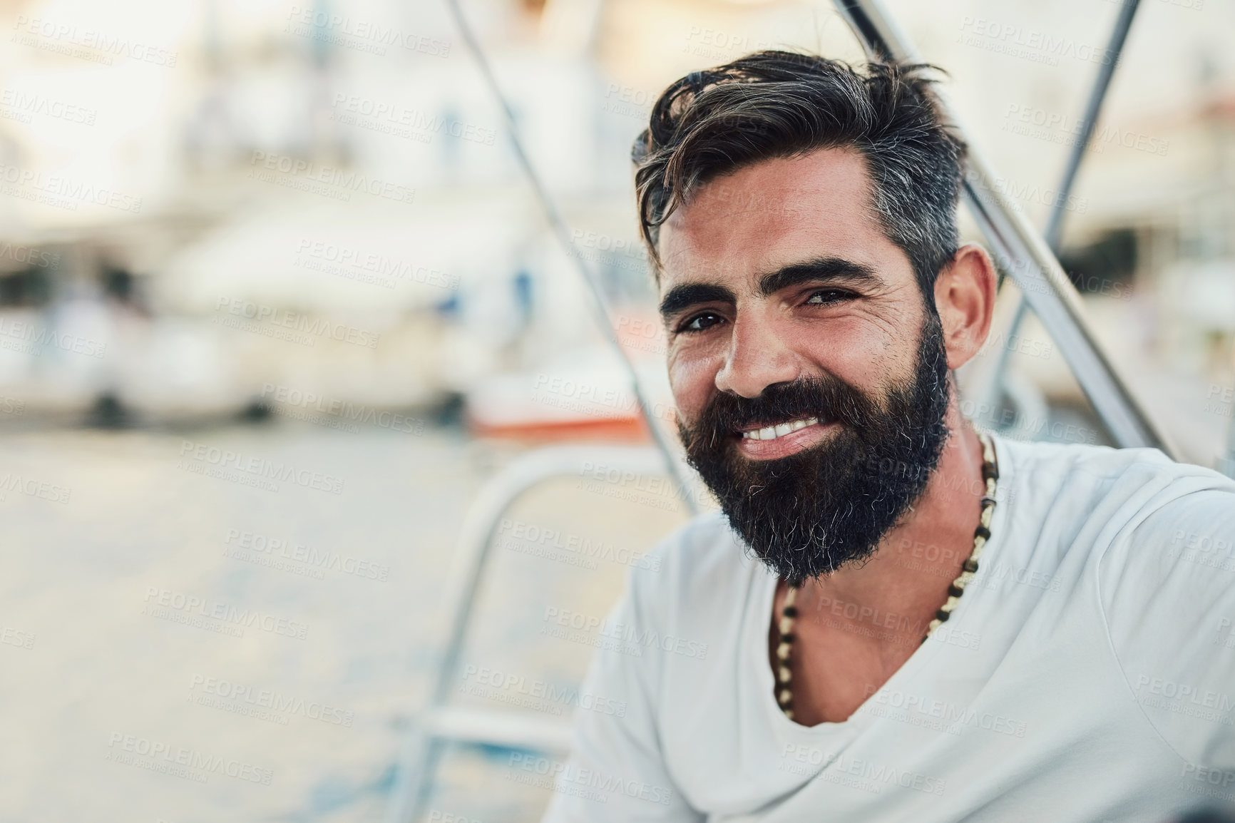 Buy stock photo Cropped shot of a handsome mature man on his yacht