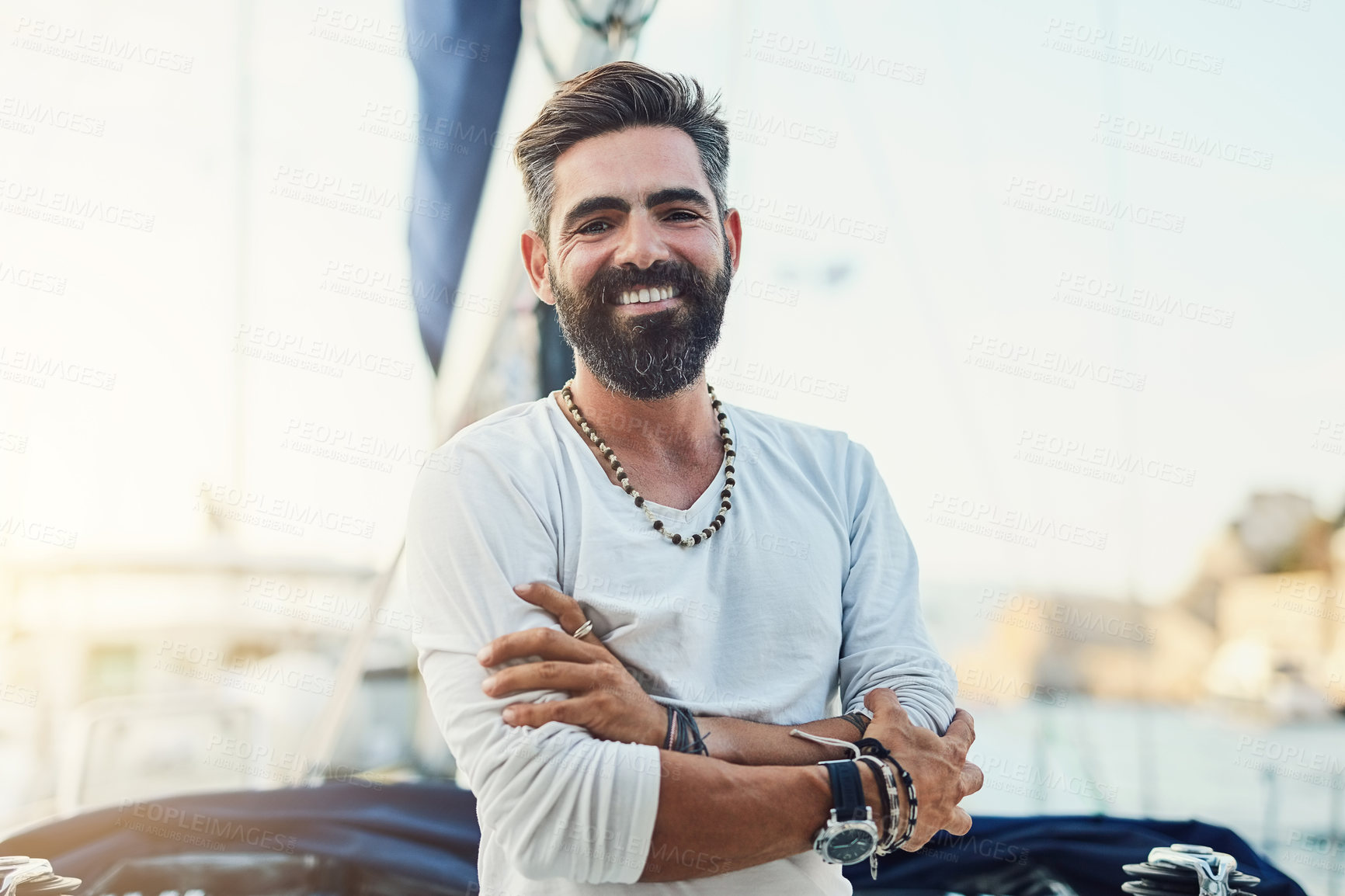 Buy stock photo Portrait, man and outdoor on yacht for adventure, fun and relax in ocean or sea on summer vacation. Male person, happy and captain on boat for sailing, holiday and travel on water with joy in Monaco