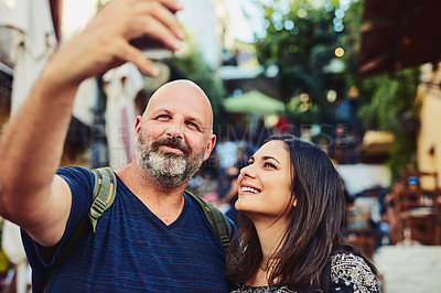 Buy stock photo Cropped shot of a happy mature couple taking a selfie