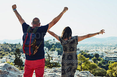 Buy stock photo Cropped shot of a couple posing against a beautiful background