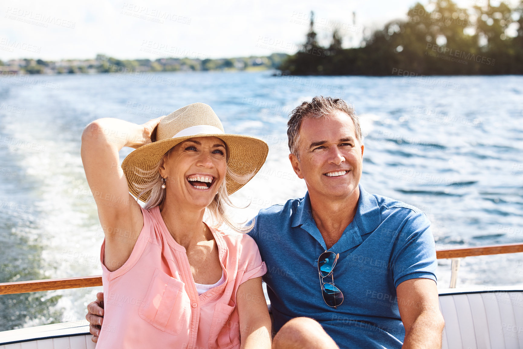 Buy stock photo Mature couple, retirement and boat cruise for relax, bonding and holiday on ocean together with happy. Man, woman and smile on luxury yacht at sea for love, vacation and romantic adventure in summer