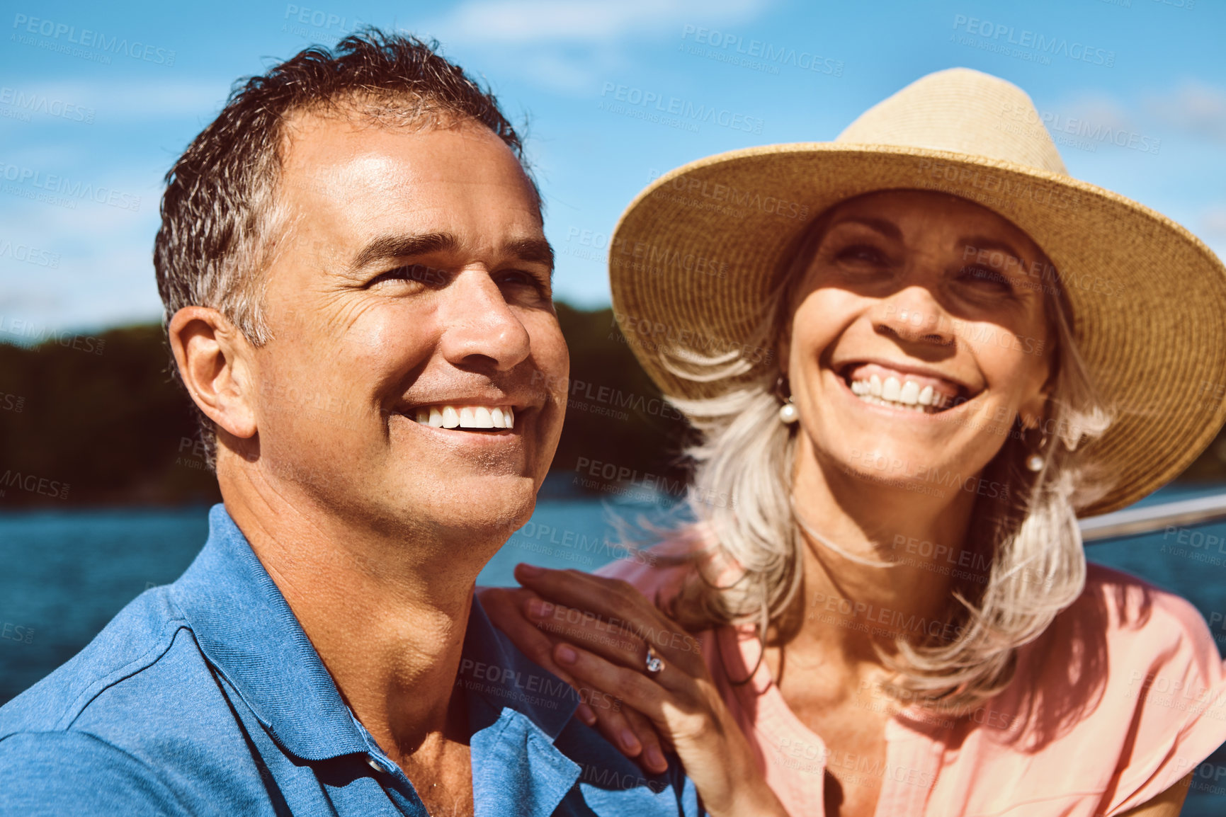 Buy stock photo Mature couple, happy and love on boat for vacation travel, sailing or adventure journey on ocean transport. Smile, man and woman relax on yacht cruise, anniversary celebration or care on outdoor date