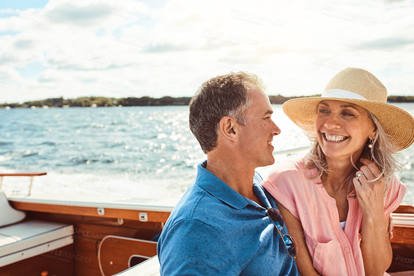 Buy stock photo Cruise, travel and yacht with mature couple at sea together for holiday, getaway or vacation for anniversary. Boat, love or smile with happy man and woman on water for bonding, romance or voyage