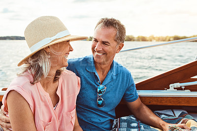 Buy stock photo Happy couple, ocean adventure and together in boat on holiday, relax on cruise date for retirement travel. Mature, woman and man on water yacht for vacation with happiness, outdoor summer in Bali