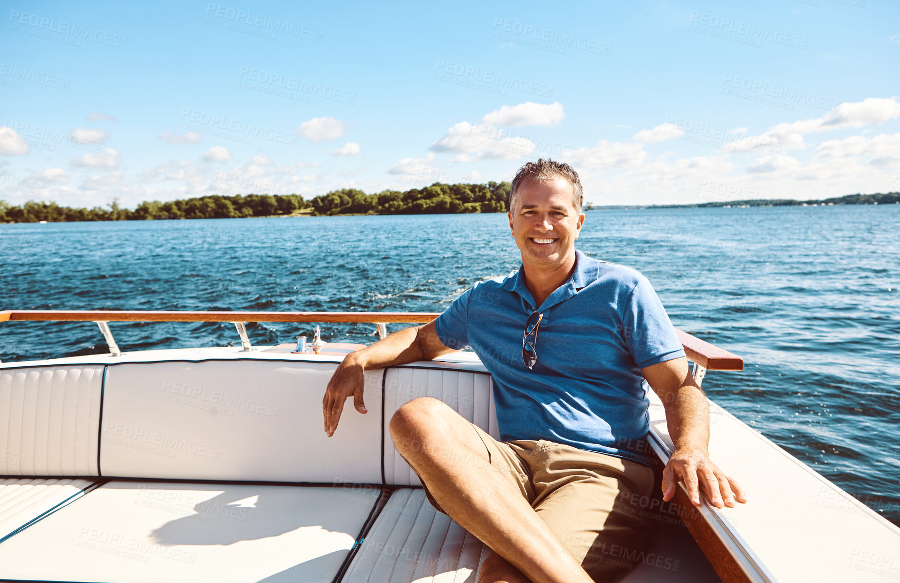 Buy stock photo Boat, mature man and portrait on vacation for travel, sailing and adventure journey on ocean transport. Happy, male person and relax on yacht ship for holiday cruise, sea and outdoor of tropical