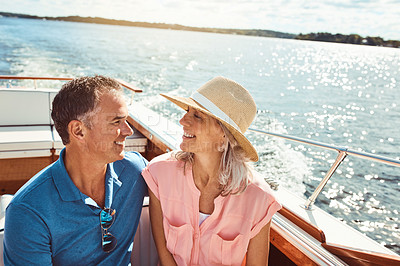 Buy stock photo Cruise, love or travel with mature couple at sea together for holiday, getaway or vacation for anniversary. Boat, smile or yacht with happy man and woman on water for bonding, romance or voyage