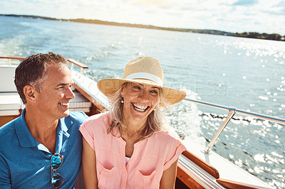 Buy stock photo Boat, cruise or funny with mature couple at sea together for holiday, getaway or vacation for anniversary. Love, smile or travel with man and woman laughing on yacht for bonding, romance or voyage