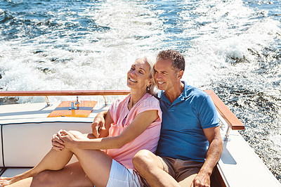 Buy stock photo Mature couple, happy and luxury yacht for holiday, bonding or retirement on ocean sailing with relax. Man, woman and hug on boat cruise at sea for love, vacation or tropical adventure by Bahamas