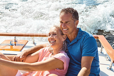 Buy stock photo Boat, romance and smile with mature couple at sea together for holiday, getaway or vacation for anniversary. Cruise. love, or travel with happy man and woman on yacht for bonding, romance or voyage