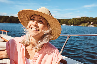 Buy stock photo Adventure, luxury and happy with mature woman on boat for sailing, travel and Miami vacation. Smile, journey and retirement with tourist and relaxing on deck of yacht for tropical, cruise and holiday