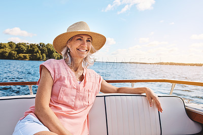 Buy stock photo Blue sky, freedom and travel with mature woman on boat for sailing, adventure and summer vacation. Smile, journey and excited with tourist and happy on deck of yacht for tropical, cruise and holiday