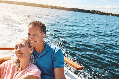 Buy stock photo Boat, outdoor and peace with mature couple at sea together for holiday, getaway or vacation for anniversary. Love, relax or travel with happy man and woman on yacht for bonding, romance or voyage