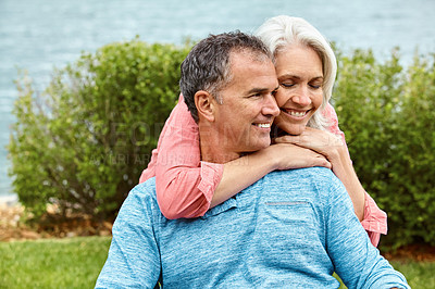 Buy stock photo Shot of a senior couple spending their day outside 