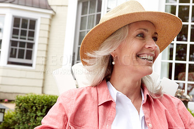 Buy stock photo Shot of a senior woman spending her day outside 