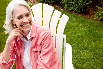 Buy stock photo Shot of a senior woman spending her day outside 