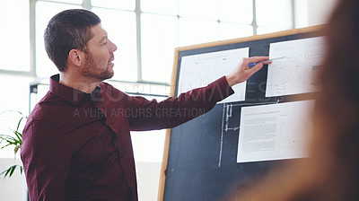 Buy stock photo Shot of a businessman giving a presentation in an office