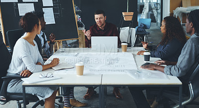 Buy stock photo Cropped shot of a group of creative businesspeople meeting in their office