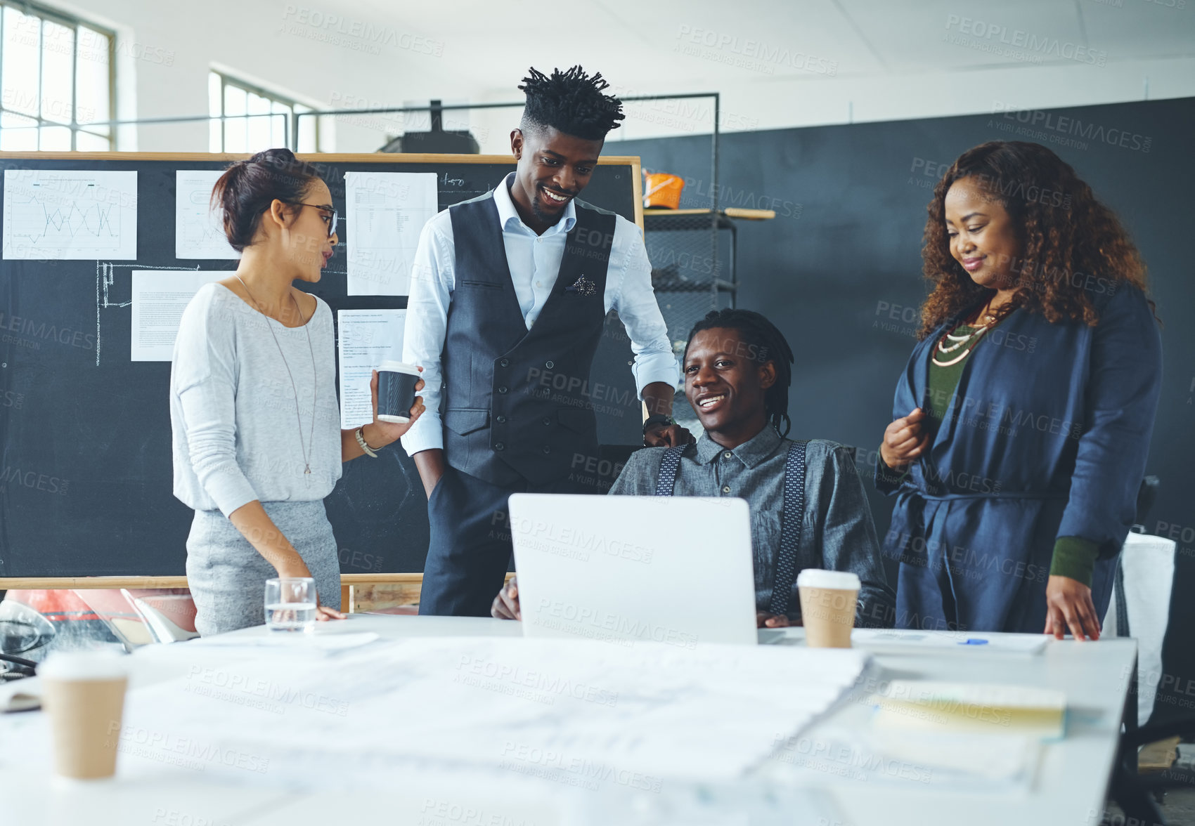 Buy stock photo Cropped shot of a group of creative businesspeople meeting in their office