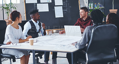 Buy stock photo Cropped shot of a group of creative businesspeople meeting in their office