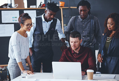 Buy stock photo Cropped shot of a group of creative businesspeople meeting in their office