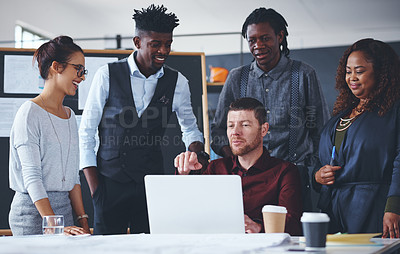 Buy stock photo Cropped shot of a group of creative businesspeople meeting in their office