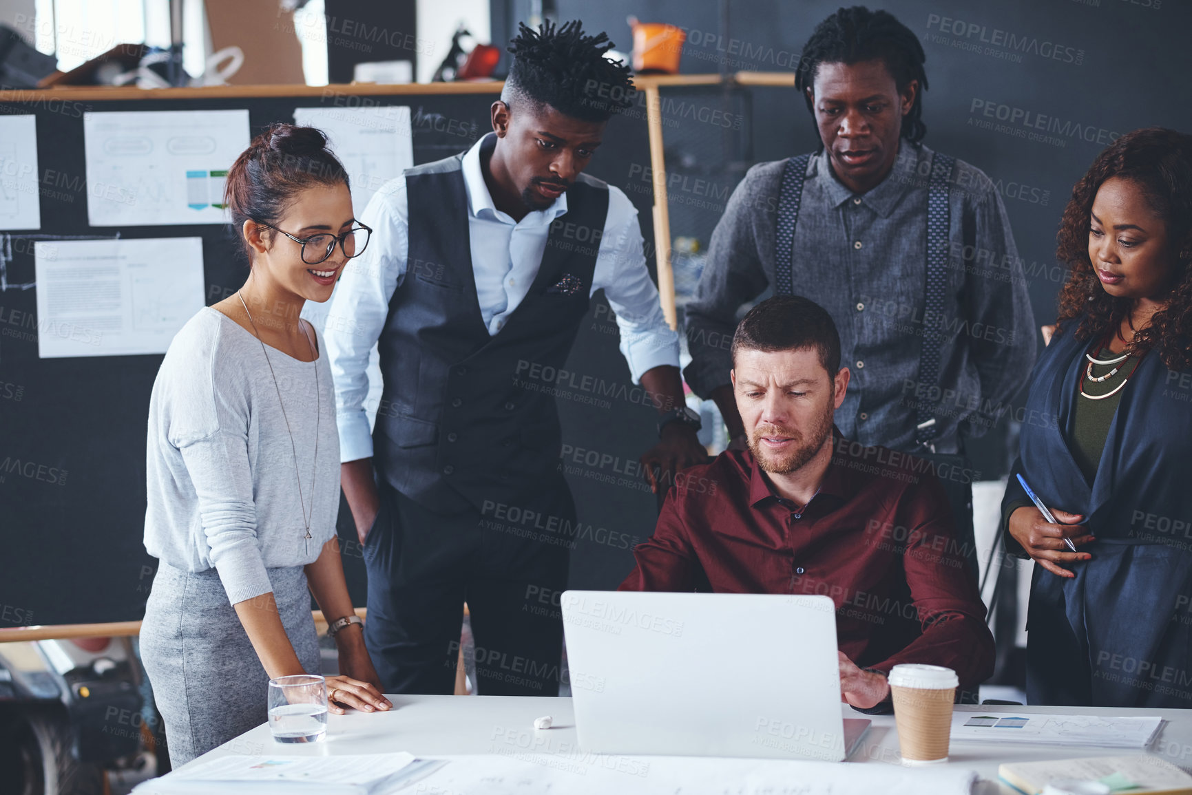 Buy stock photo Cropped shot of a group of creative businesspeople meeting in their office