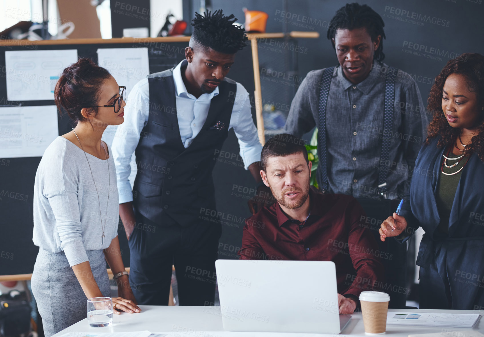 Buy stock photo Cropped shot of a group of creative businesspeople meeting in their office