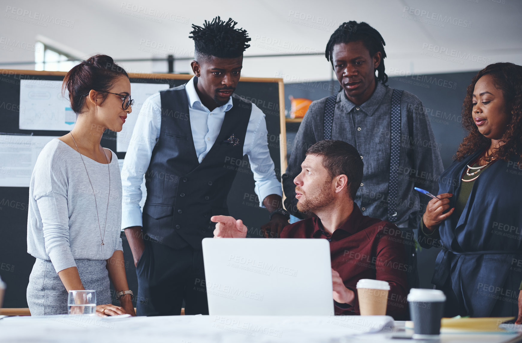 Buy stock photo Cropped shot of a group of creative businesspeople meeting in their office