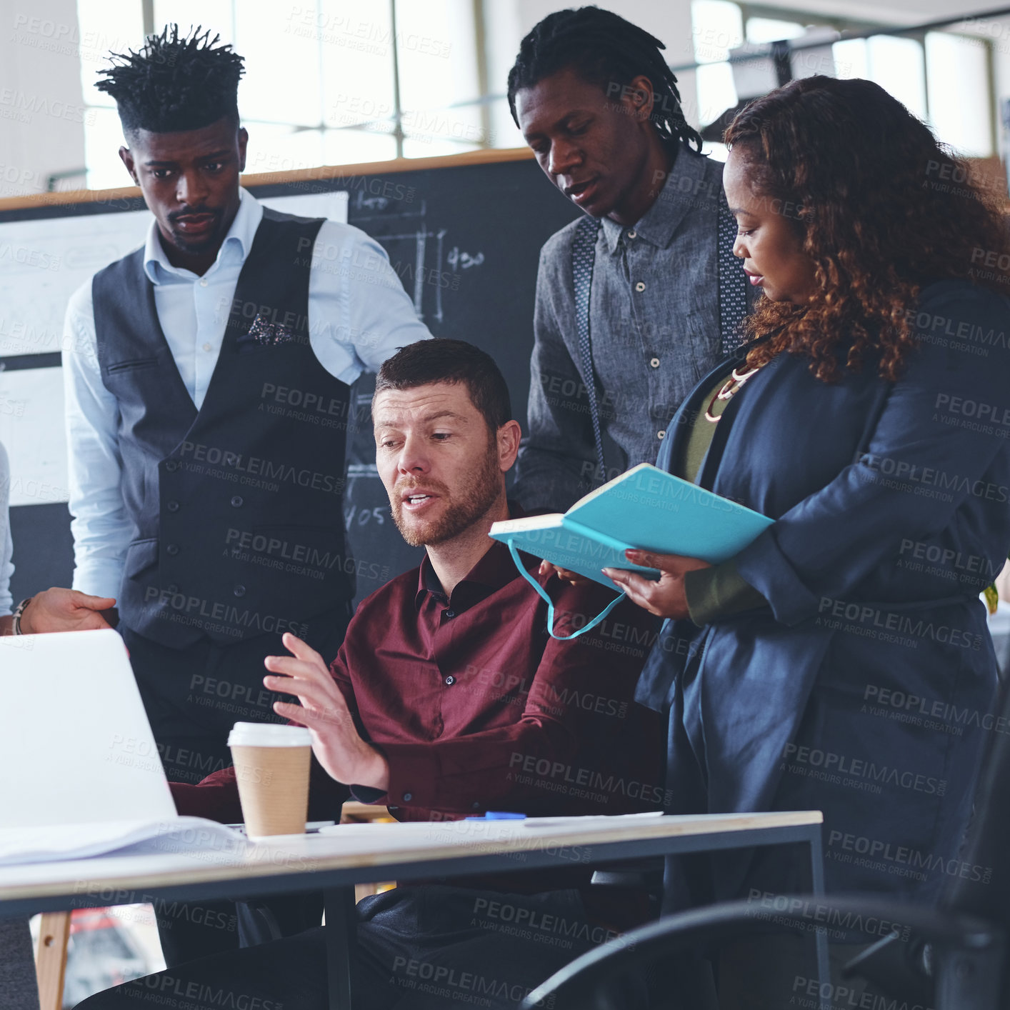 Buy stock photo Cropped shot of a group of creative businesspeople meeting in their office