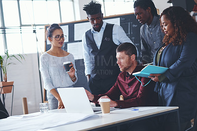 Buy stock photo Cropped shot of a group of creative businesspeople meeting in their office