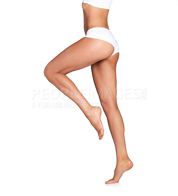 Buy stock photo Beauty, legs and woman with mockup in studio for skincare, smooth and soft perfection on white background. Feet, leg and girl model in underwear for skin, glow and luxury wellness while isolated