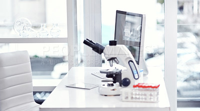 Buy stock photo Shot of a desk with scientific equipment on it inside of a laboratory