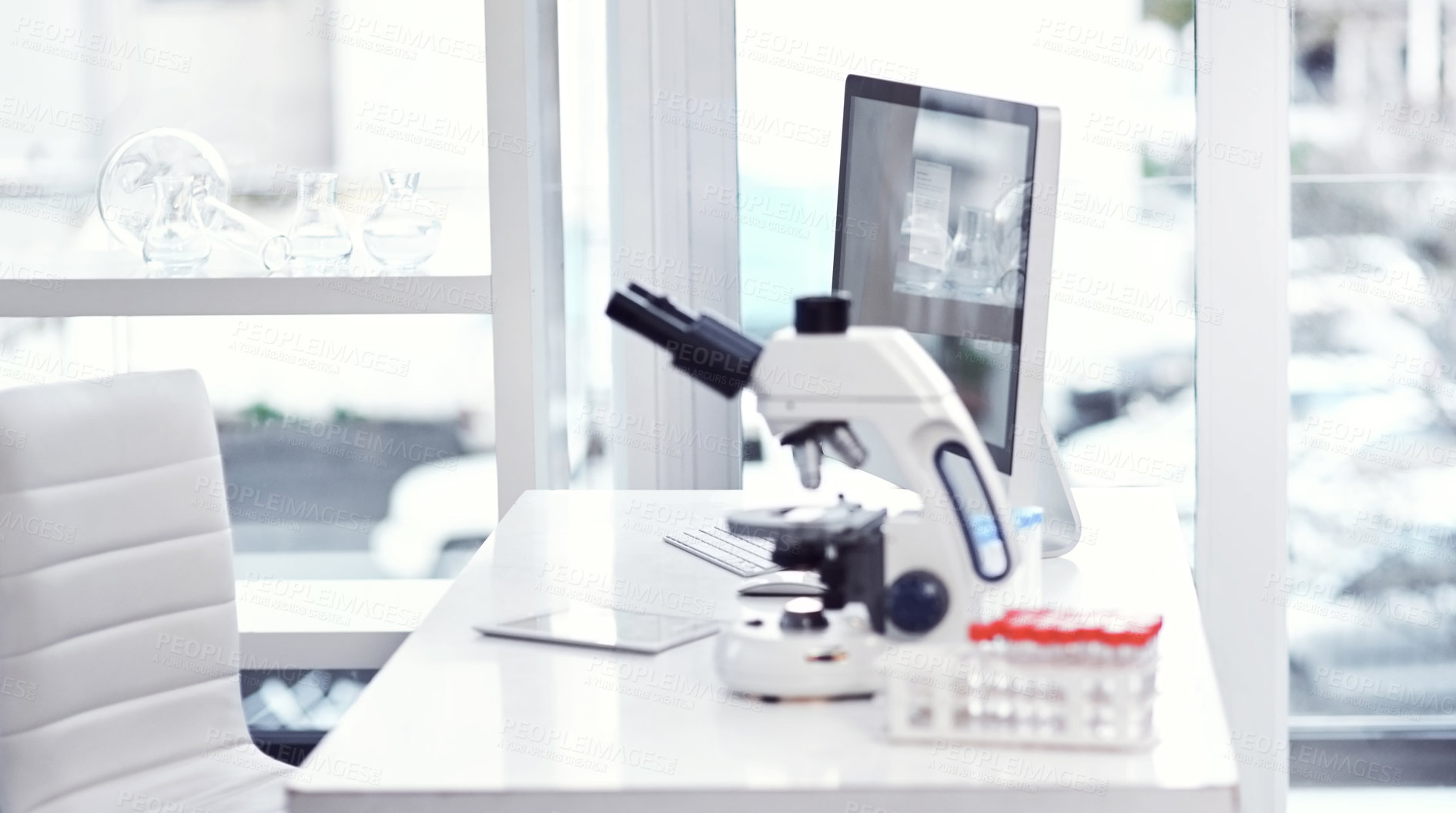 Buy stock photo Shot of a desk with scientific equipment on it inside of a laboratory