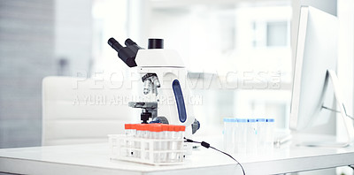 Buy stock photo Shot of a desk with scientific equipment on it inside of a laboratory