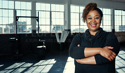 Buy stock photo Portrait of a young woman in a gym