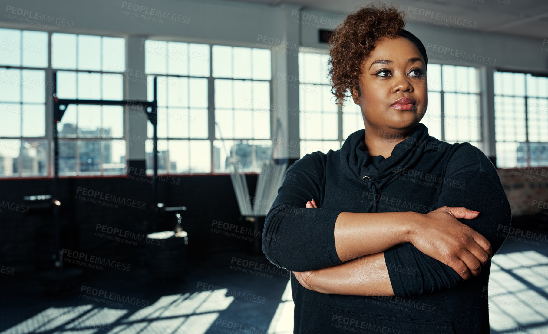 Buy stock photo Thinking, arms crossed and black woman in gym, exercise and future vision for fitness goals. African person, pride and athlete with target, wellness and training with reflection, workout and calm