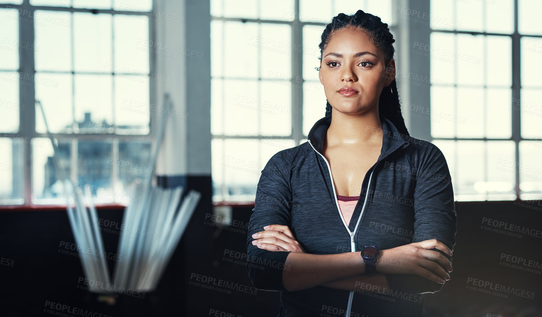 Buy stock photo Portrait of a young woman in a gym