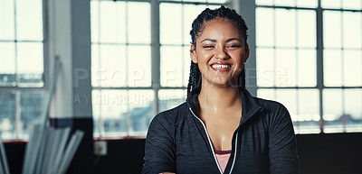 Buy stock photo Portrait of a young woman in a gym