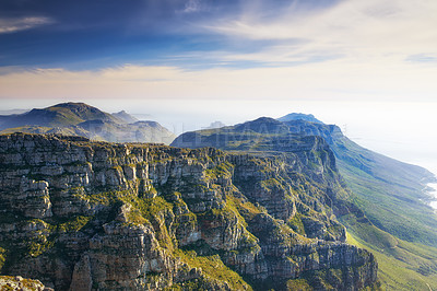 Buy stock photo Landscape view, blue sky with copy space of Table Mountain in Western Cape, South Africa. Steep scenic famous hiking and trekking terrain with lush green mountainside. Travel and tourism to landmark