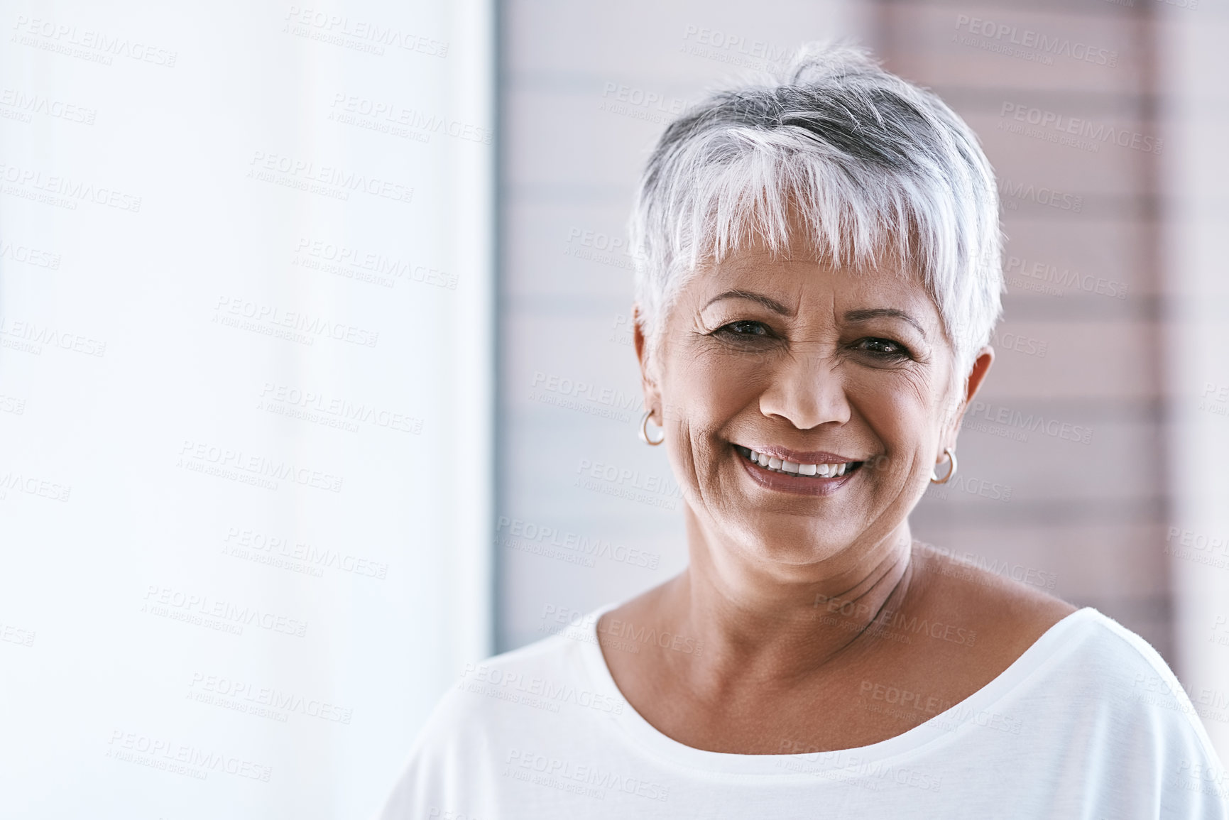 Buy stock photo Portrait of a cheerful mature woman with a bright smile looking at the camera