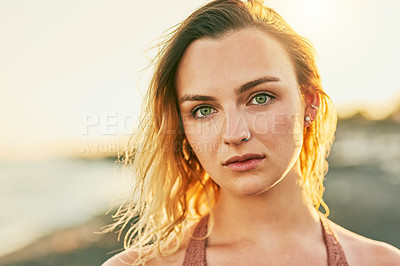 Buy stock photo Shot of a young beautiful woman at the beach