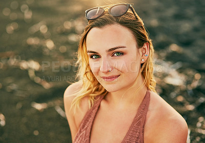 Buy stock photo Shot of a young beautiful woman at the beach