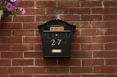 Buy stock photo Full length shot of a letter box on a wall