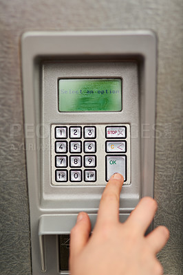 Buy stock photo Cropped view of a male hand using an ATM