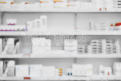 Buy stock photo Shot of a shelf full of medication  and medication boxes all neatly placed next to each other in a pharmacy