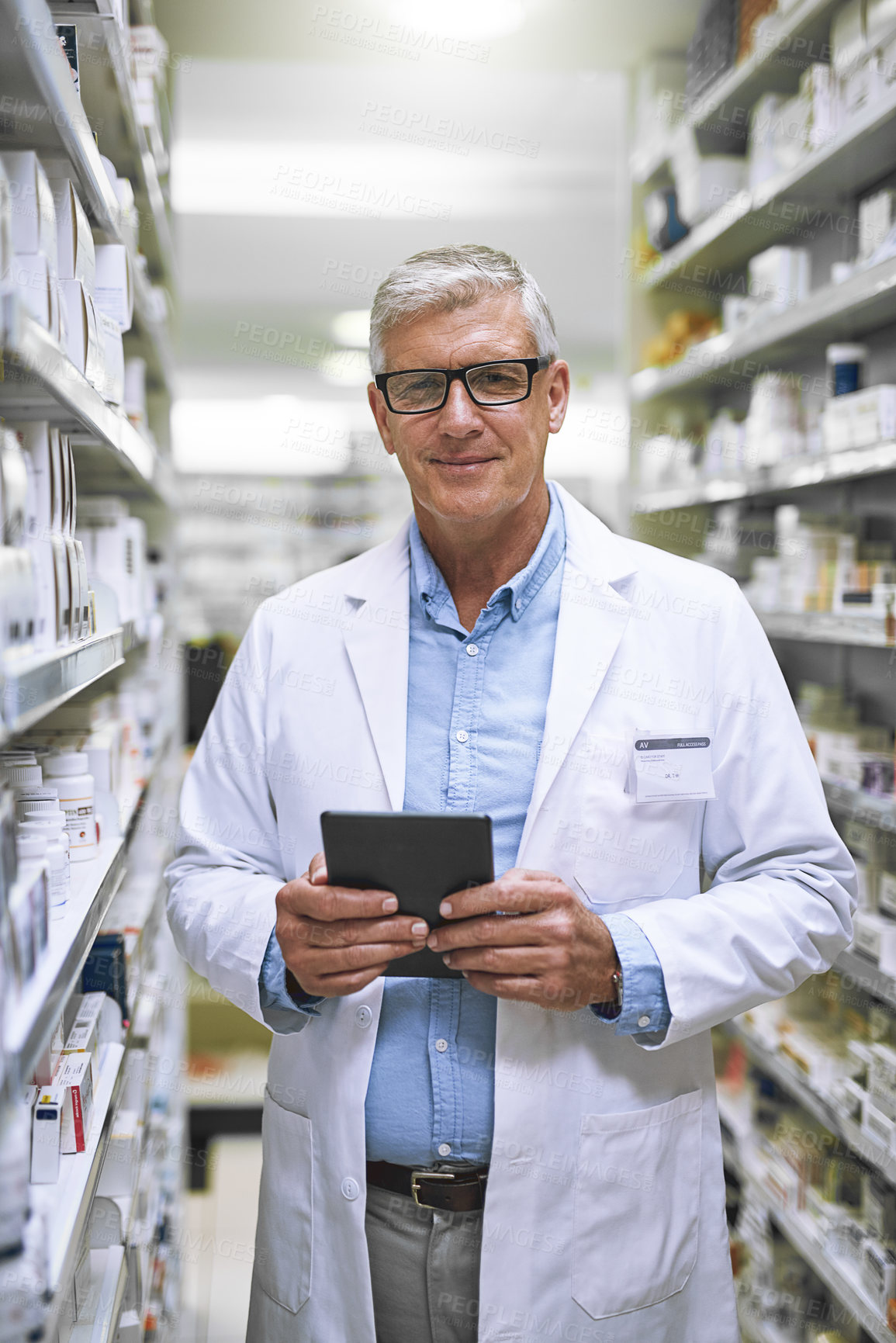 Buy stock photo Portrait, pharmacy and senior man on tablet for stock, inventory and medical information notes. Medicine, checklist and face of happy elderly male pharmacist online for pills and prescription