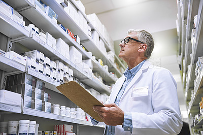 Buy stock photo Pharmacy, medicine and documents with man and clipboard in store for checklist, inspection and inventory. Medical, healthcare and pills with senior male pharmacist in clinic for wellness and product