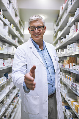 Buy stock photo Senior man, pharmacist and handshake for introduction or greeting at a healthcare pharmacy. Portrait of happy elderly male person or medical expert shaking hands in pharmaceutical for health advice